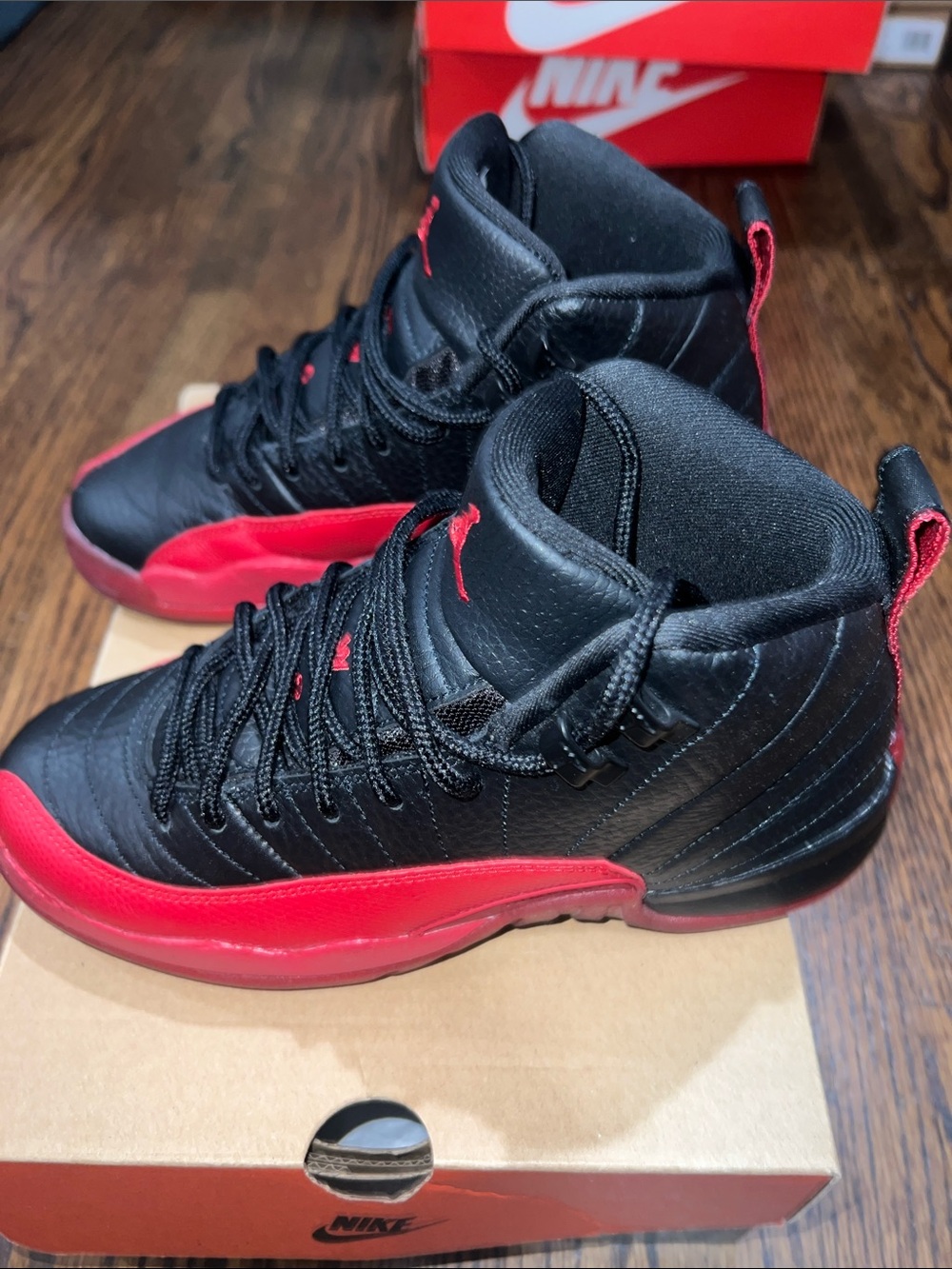 Flu Game Jordan Retro 12 - Black & Red
Size 5y